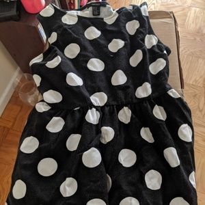 Black and white polka dot sleeveless dress